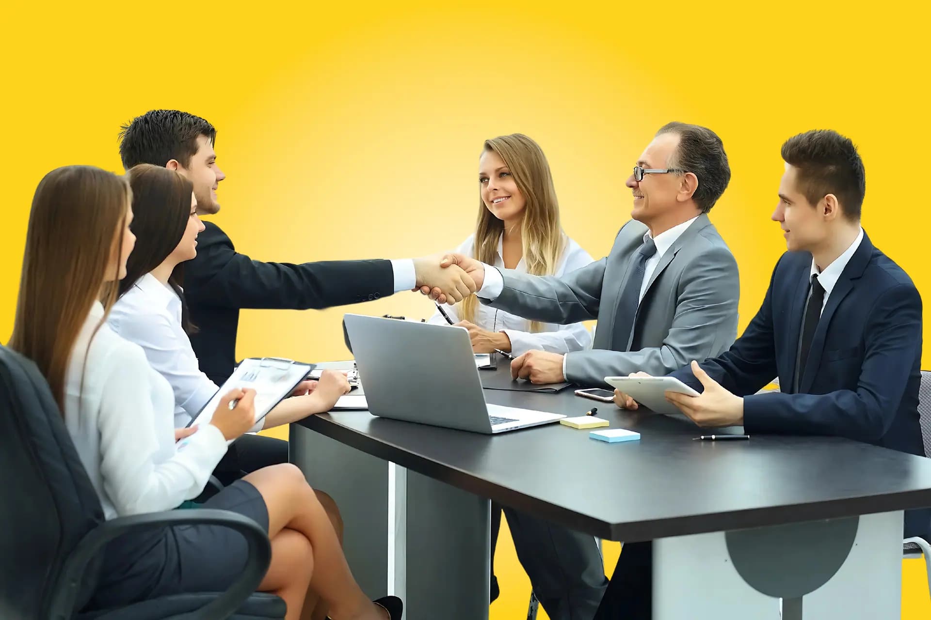 The Bumppd team meeting with a client around a table